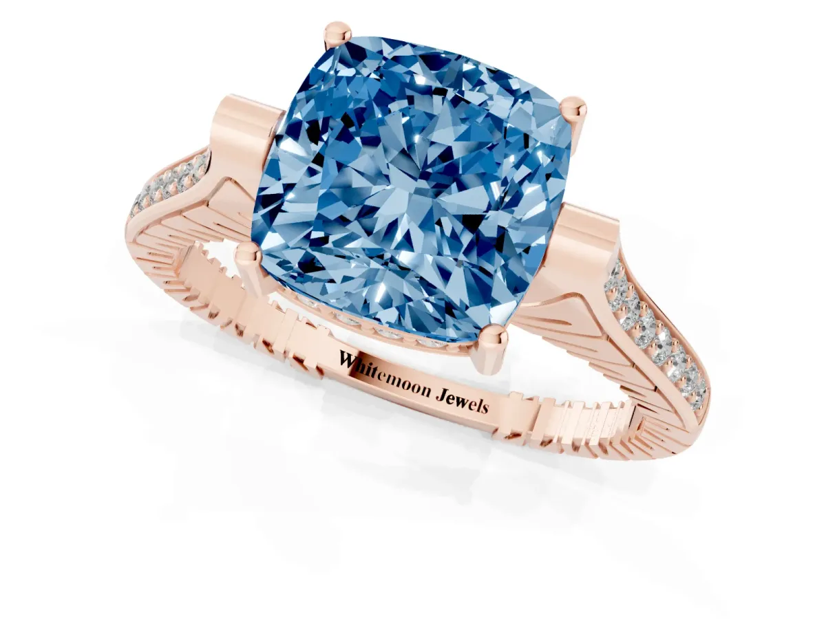 Fancy Blue Cushion Cut Solitaire Diamond Ring with Channel Set Band and Bezel Prong Setting Rose gold