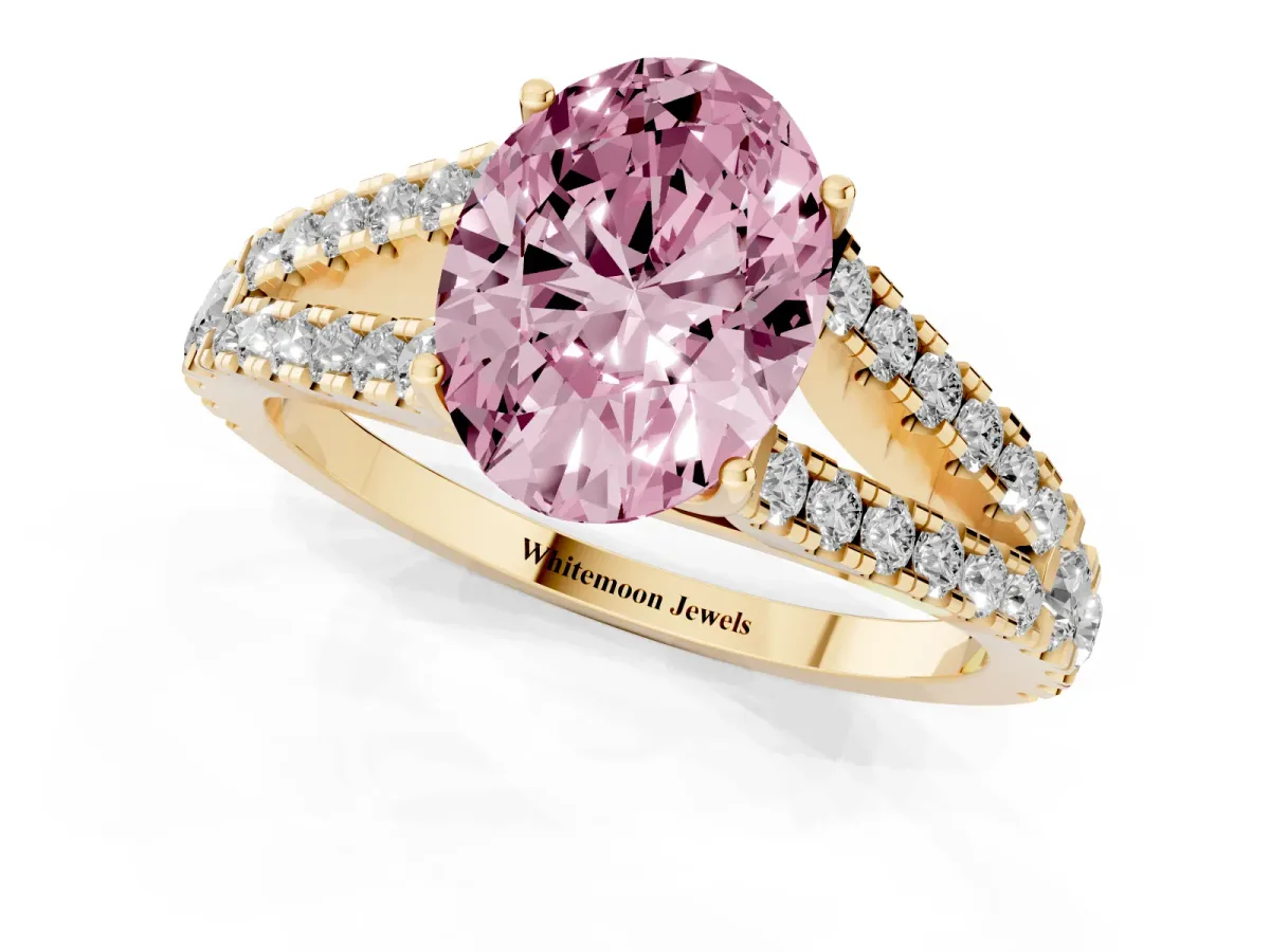 Fancy Pink Oval Cut Diamond Split Shank Pavé Engagement Ring with Four-Prong Setting Yellow gold
