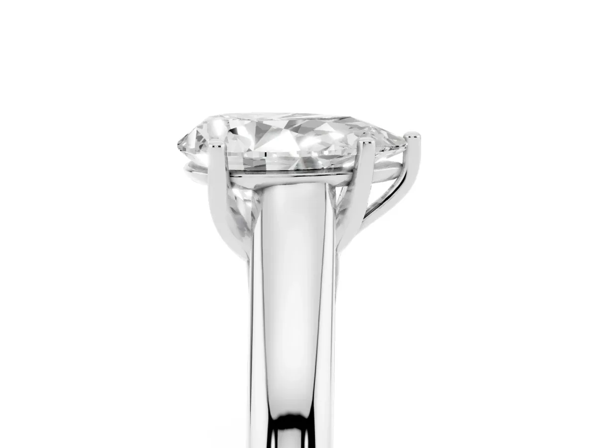 Pear Cut Solitaire Engagement Ring with Tapered Band and Four-Prong Setting White gold