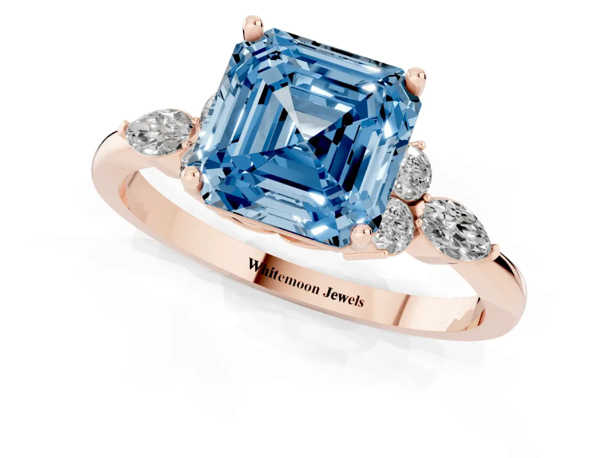 Fancy Blue Asscher Cut Brilliant Diamond Solitaire Ring with Pear Side Stones and Four-Prong Setting Rose gold
