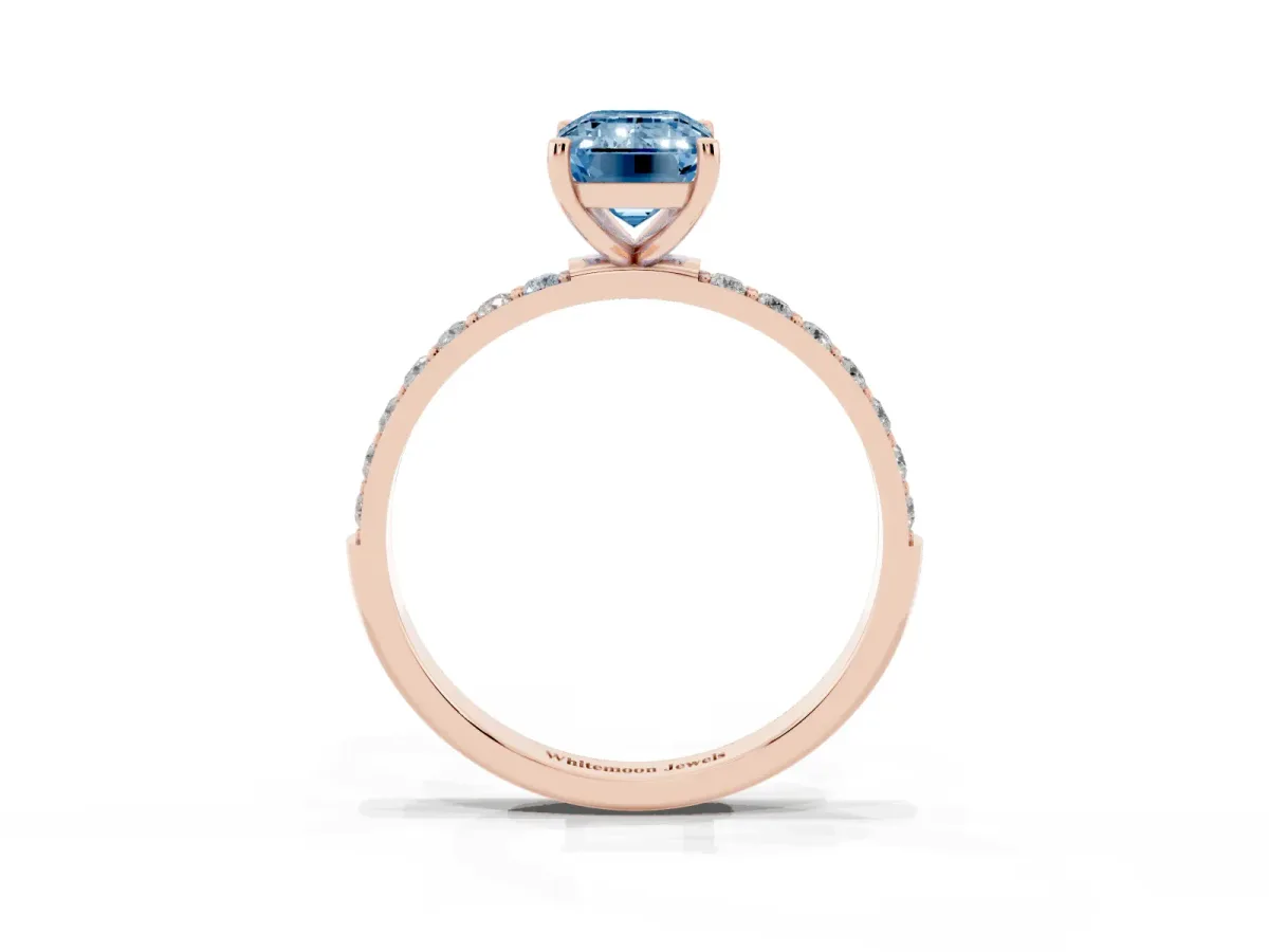 Fancy Blue Emerald Cut Diamond Solitaire Ring with Round Pavé Shoulders and Prong Setting Rose gold