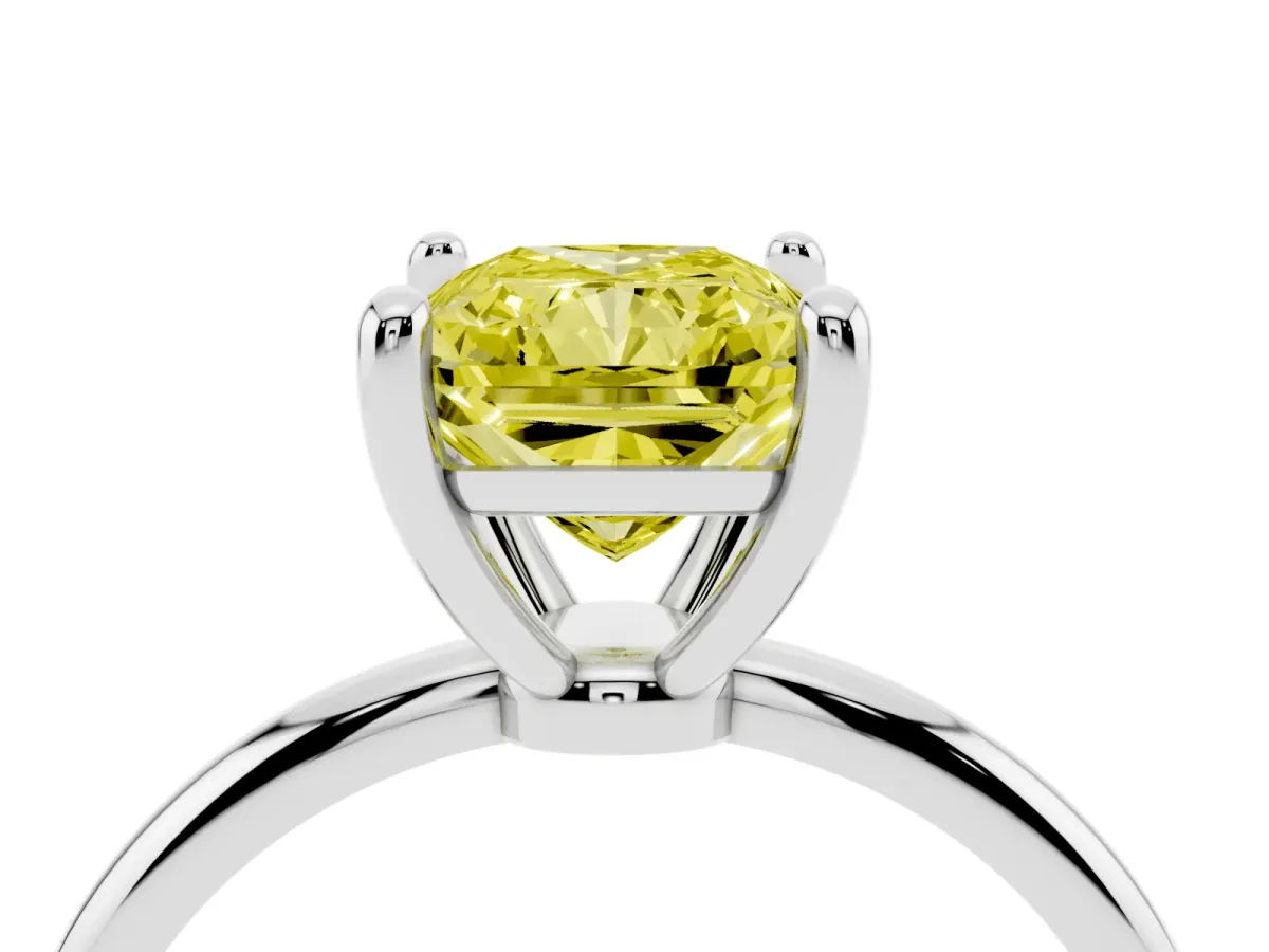 Fancy Yellow Radiant Cut Solitaire Diamond Ring with 4-Prong Setting on a Classic Band Platinum