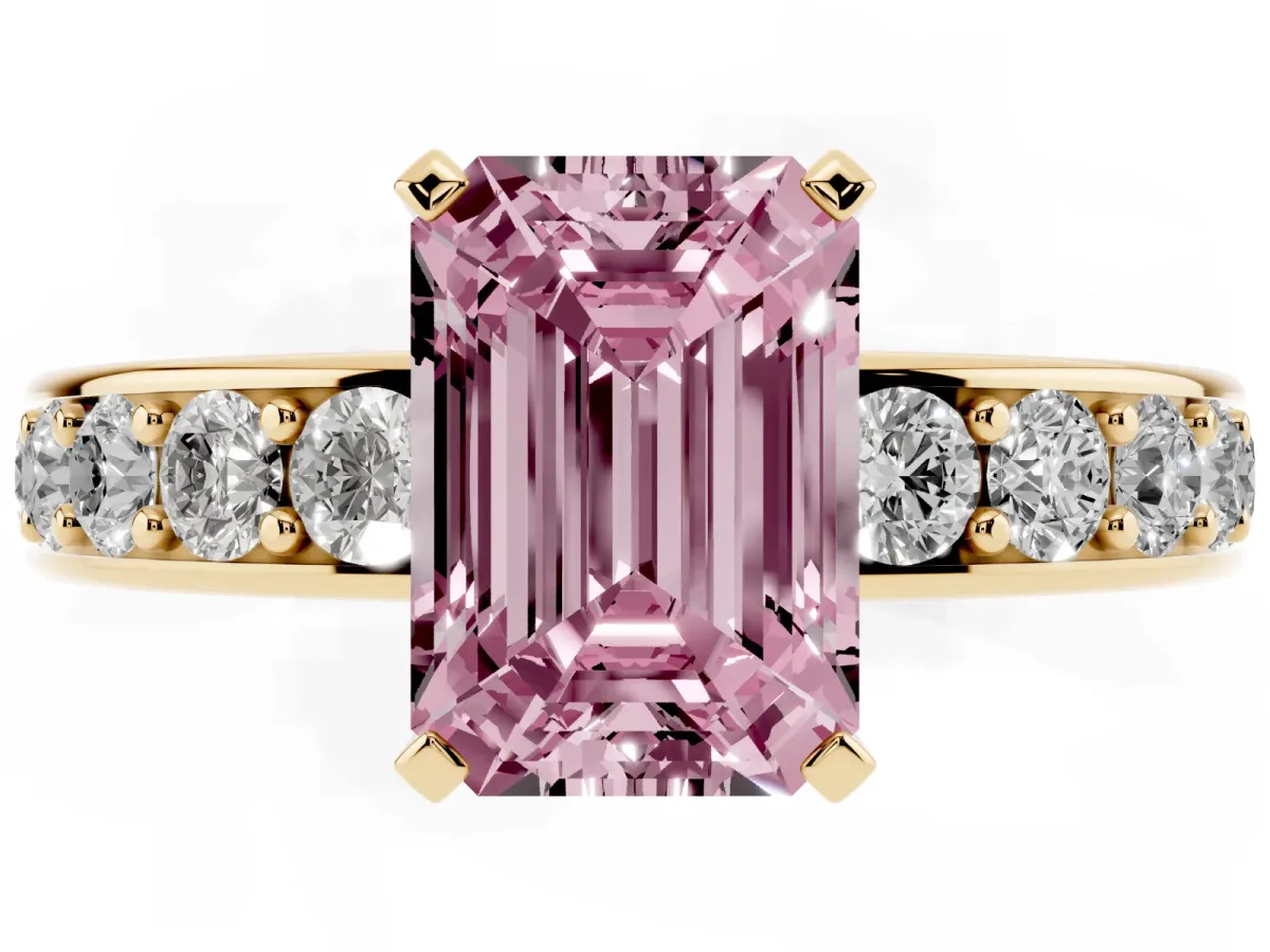 Fancy Pink Emerald Cut Diamond Engagement Ring with Channel Set Round Band and Prong Setting Yellow gold
