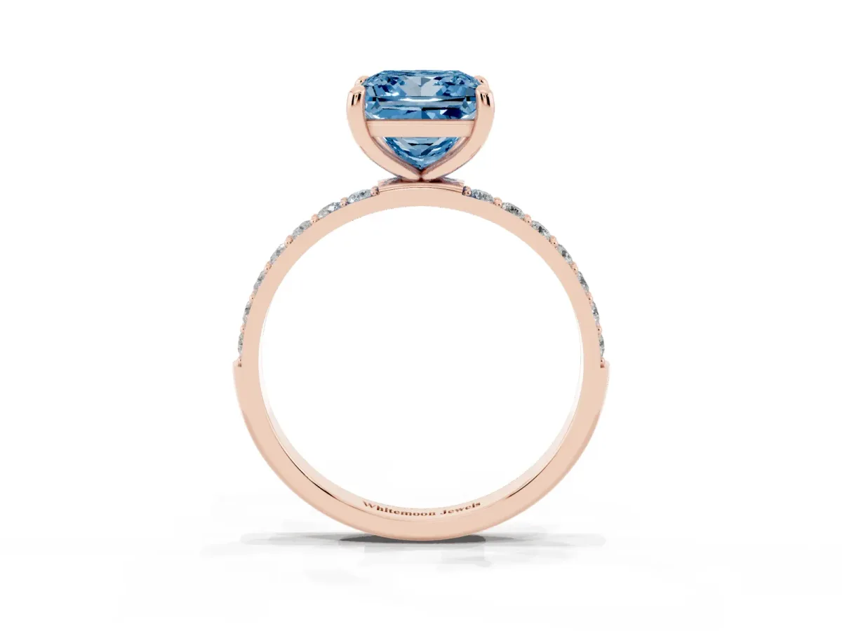 Fancy Blue Princess Cut Diamond Solitaire Ring with Round Pavé Band and Prong Setting Rose gold