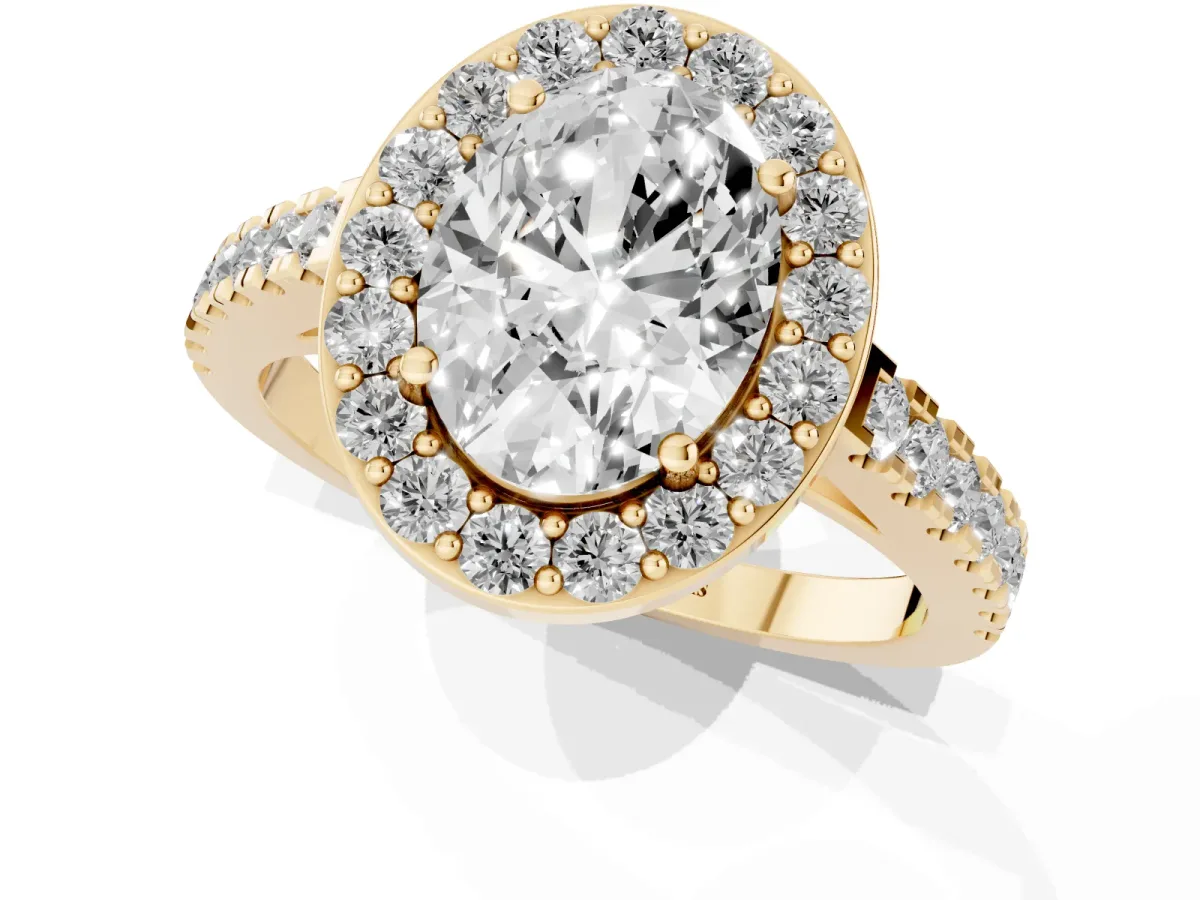 Oval Cut Diamond Halo Ring with Round Pavé Split Shank and Prong Setting Yellow gold