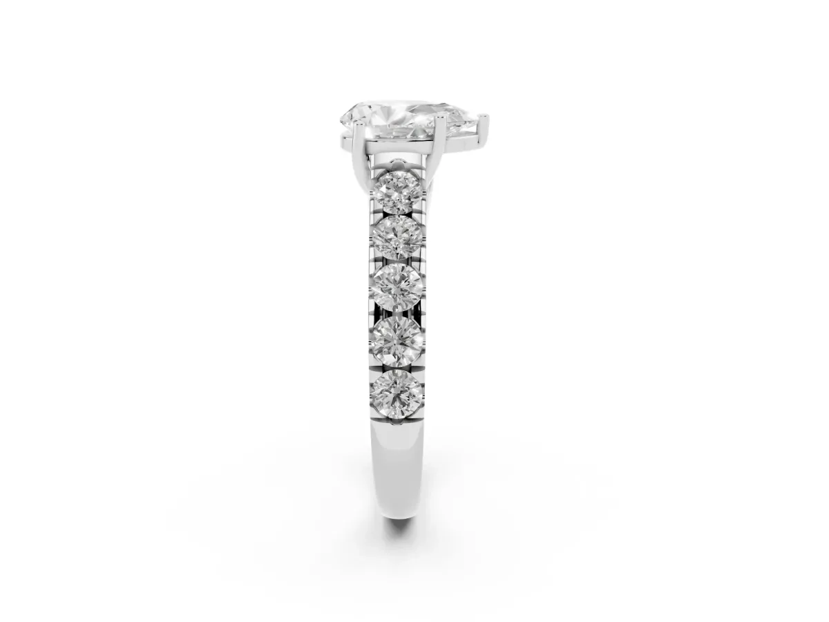 Pear Cut Cut Diamond Solitaire Ring with Micro Pave Band and Prong Setting Platinum
