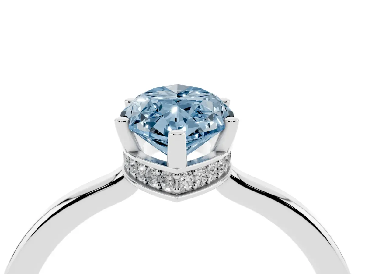 Fancy Blue Marquise Cut Cut Solitaire Engagement Ring with Four-Prong Setting on a Classic Band Silver