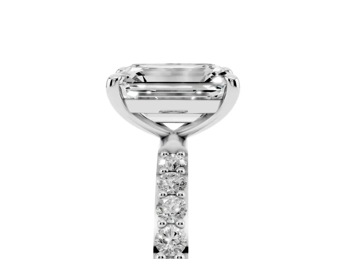 Emerald Cut Diamond Solitaire Ring with Round Pavé Band and Prong Setting Platinum