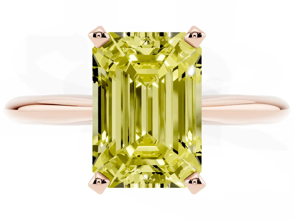 Fancy Yellow Emerald Cut Cut Solitaire Ring with Four-Prong Setting on a Classic Band Rose gold
