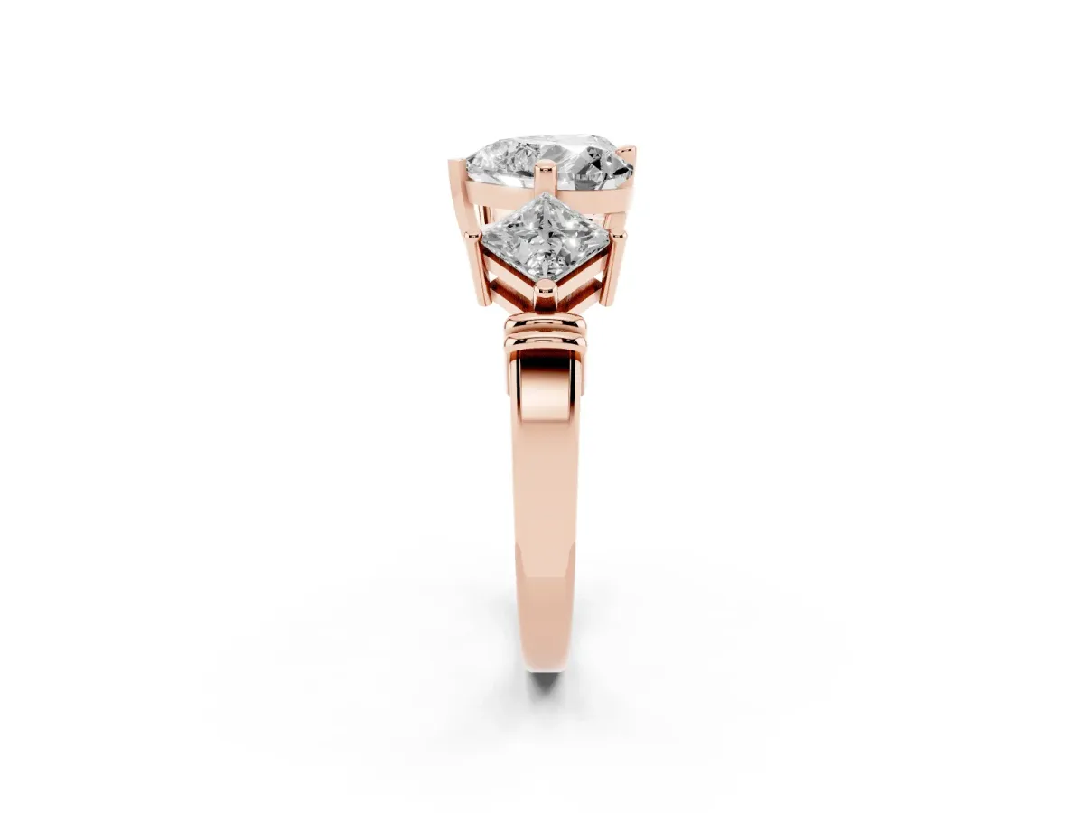 Three-Stone Heart Cut and Princess Cut Diamond Ring with Channel Band and Four-Prong Setting Rose gold