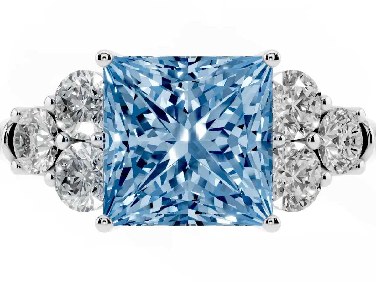 Fancy Blue Princess Cut Cut Diamond Cluster Ring with Round Accent Stones and Prong Setting on a Classic Band Silver
