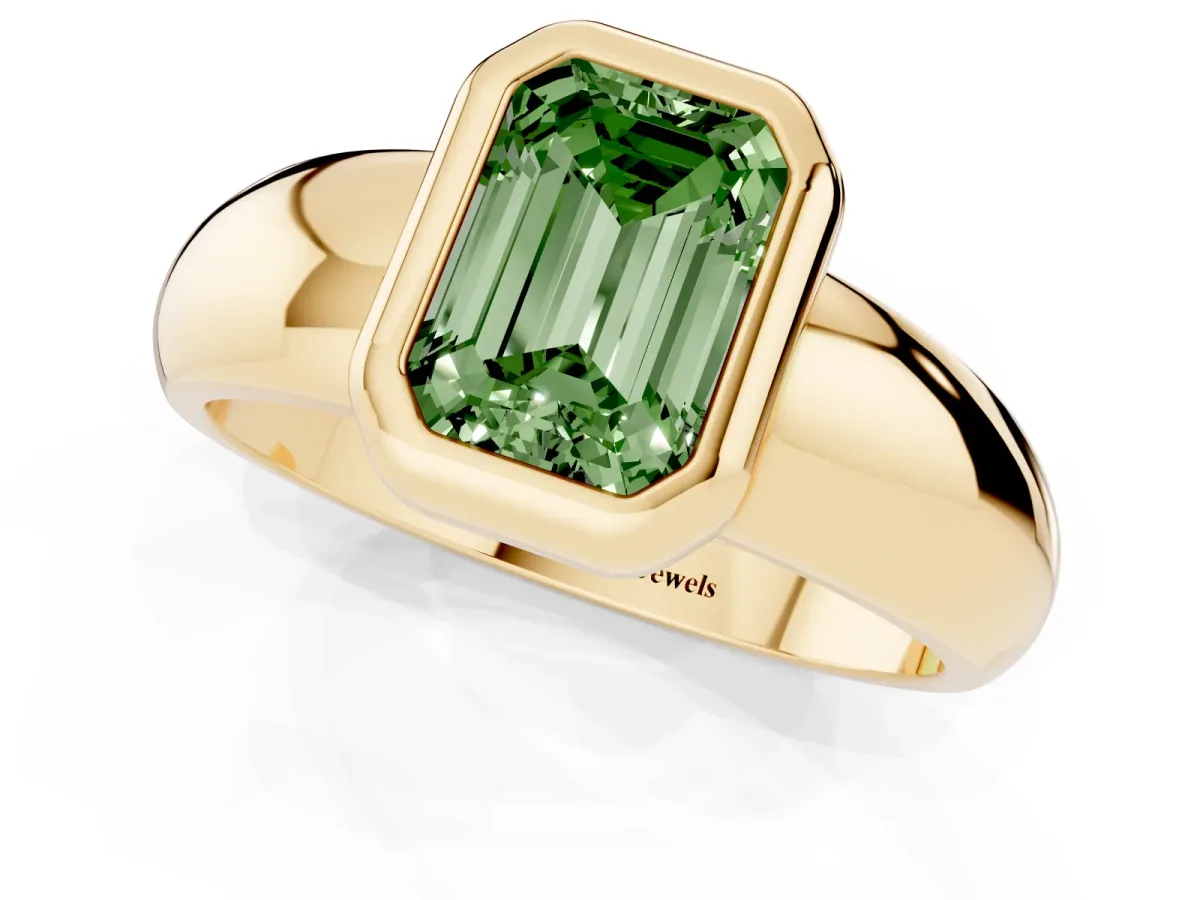 Fancy Green Bezel Set Emerald Cut Solitaire Ring with Wide Band Yellow gold
