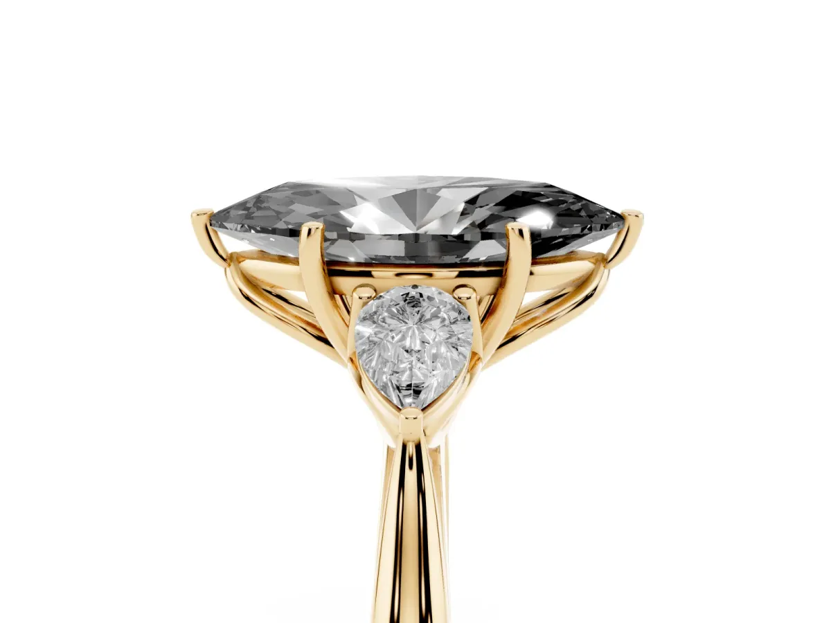 Fancy Black Marquise Cut Diamond Three-Stone Ring with Pear Side Stones and Prong Setting Yellow gold