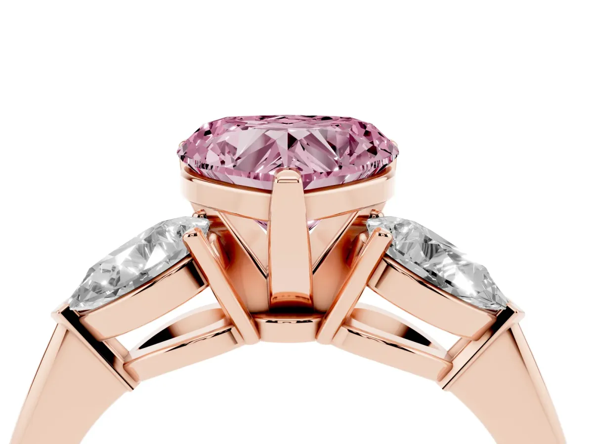 Fancy Pink Three-Stone Heart Cut Diamond Ring with Pear Side Stones and Four-Prong Setting Rose gold