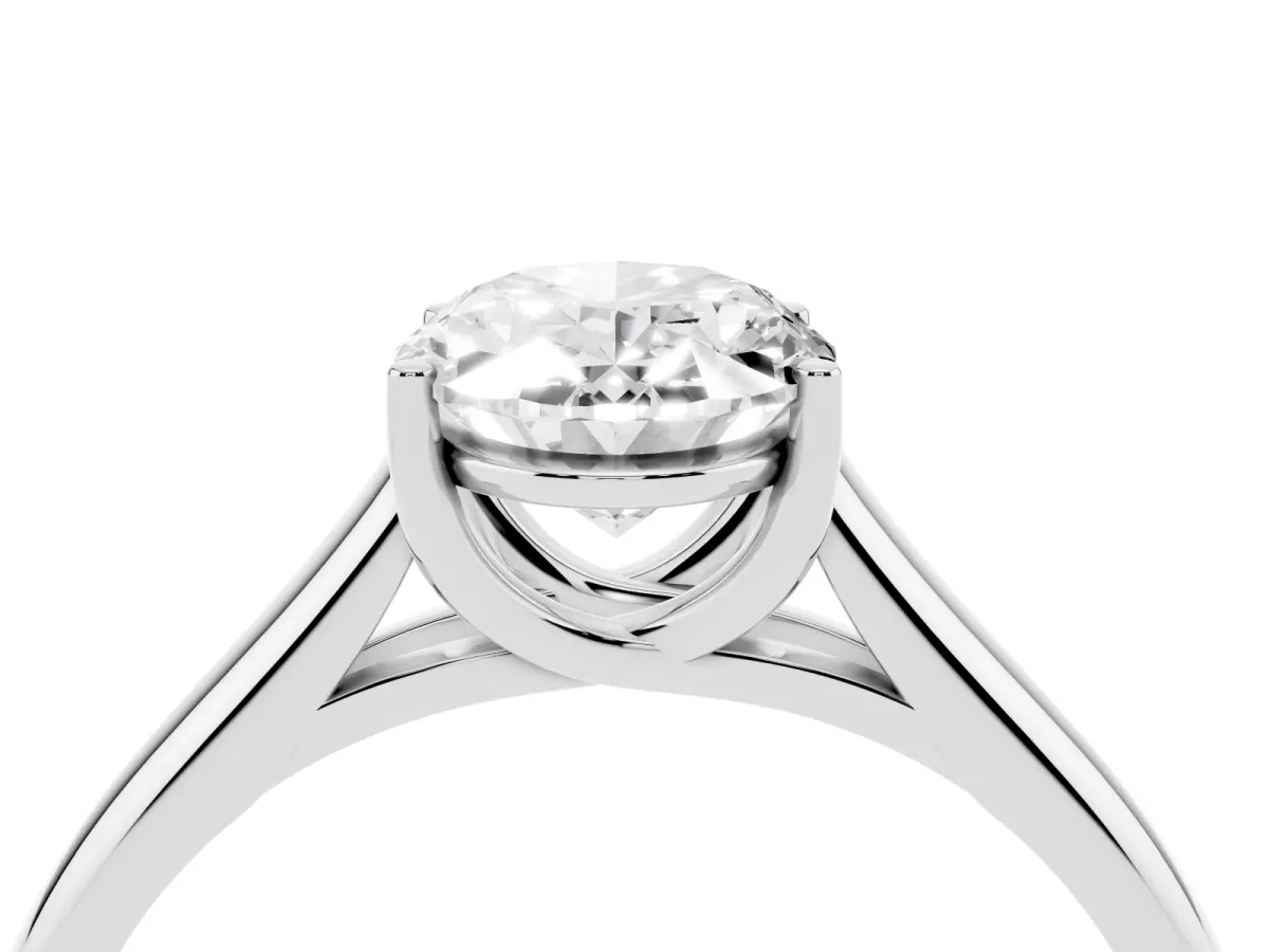 Oval Cut Solitaire Engagement Ring with Tapered Band and Four-Prong Setting Platinum