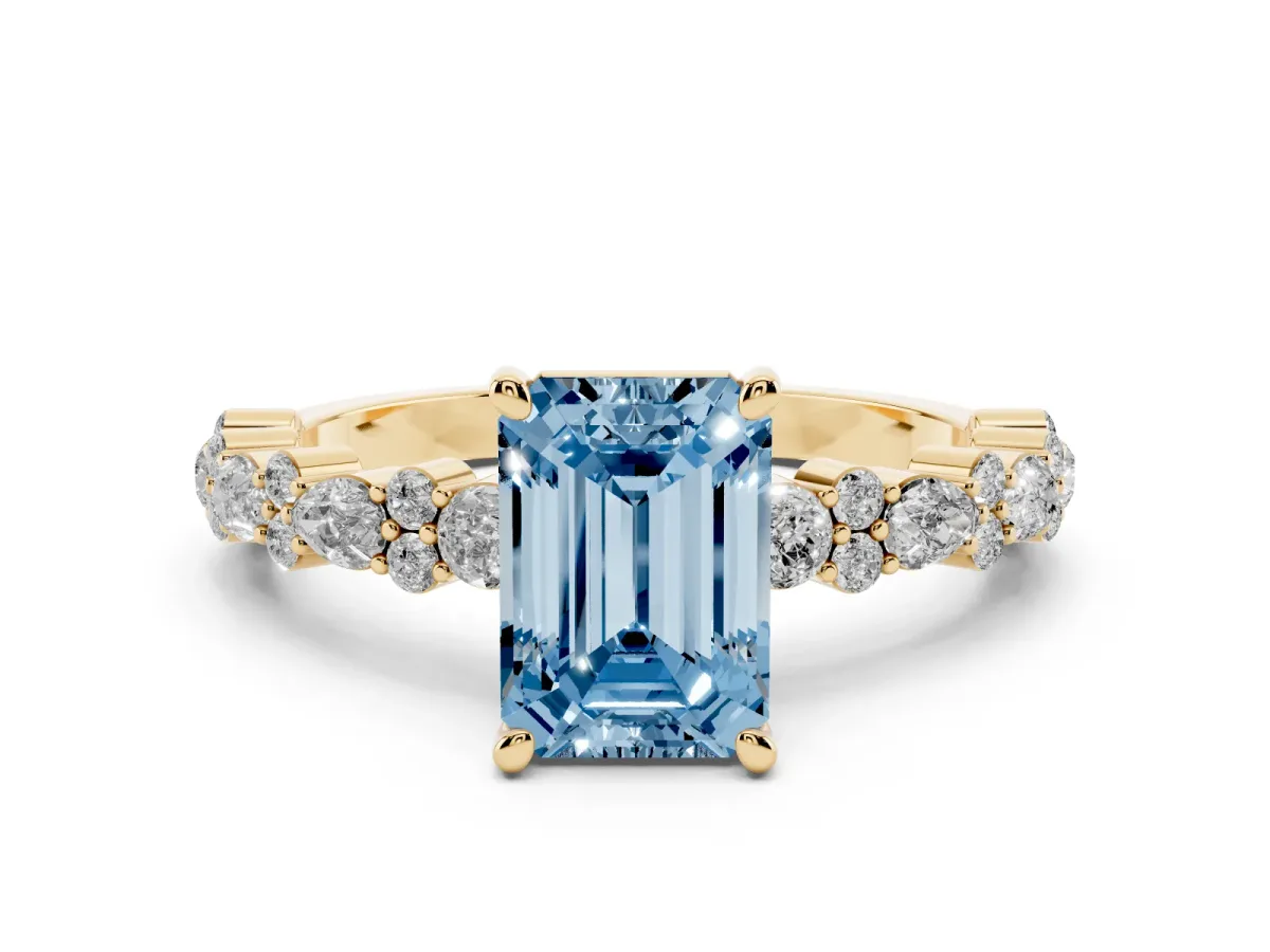 Fancy Blue Emerald Cut Diamond Side Stone Solitaire Ring with Round and Four-Prong Setting Yellow gold