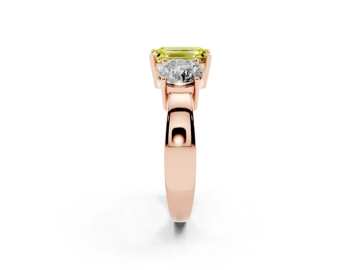 Fancy Yellow Three-Stone Emerald Cut Diamond Ring with Round Side Stones, Classic Band, and Four-Prong Setting Rose gold