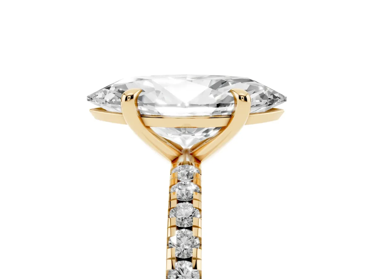 Marquise Cut Diamond Brilliant Solitaire Ring with Pavé Band and Four-Prong Setting Yellow gold