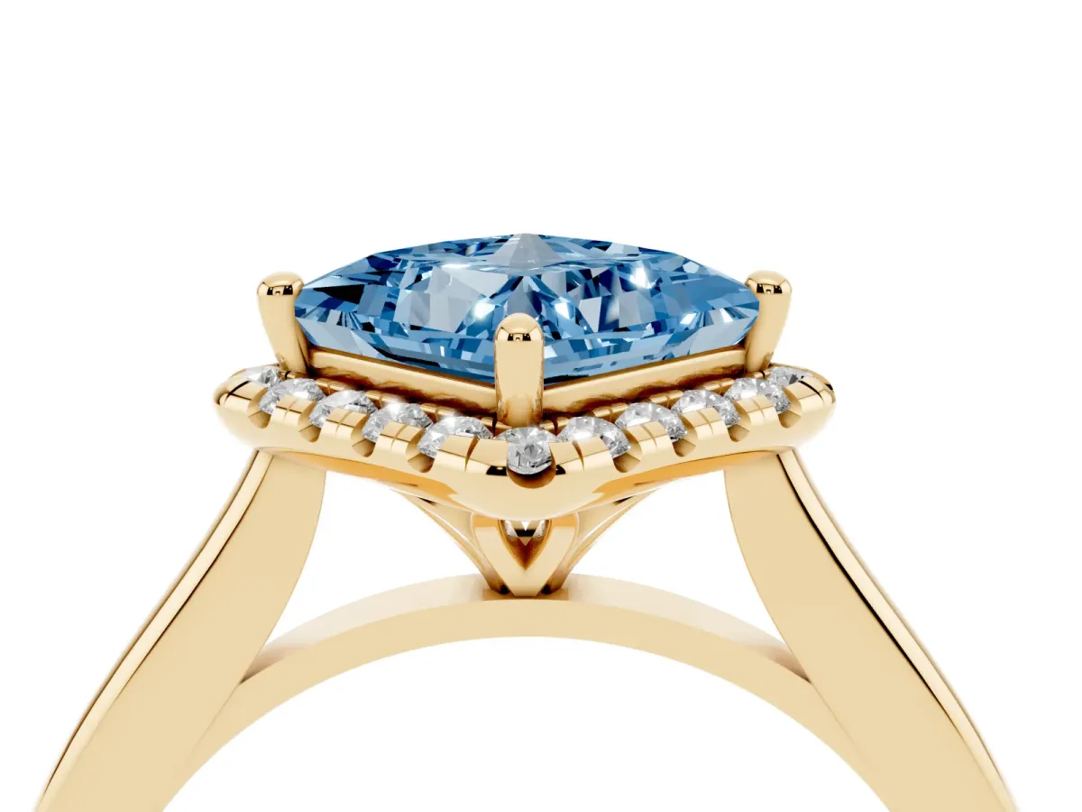 Fancy Blue Princess Cut Halo Round Diamond Solitaire Engagement Ring with Pave Band and Four-Prong Setting Yellow gold