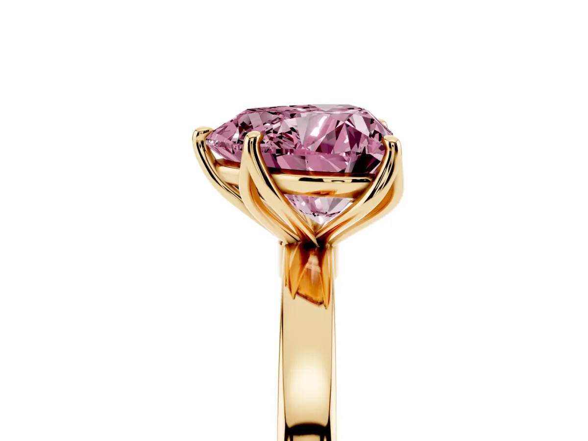 Fancy Pink Heart Cut Diamond Solitaire Ring with Thin Band and Prong Setting Yellow gold