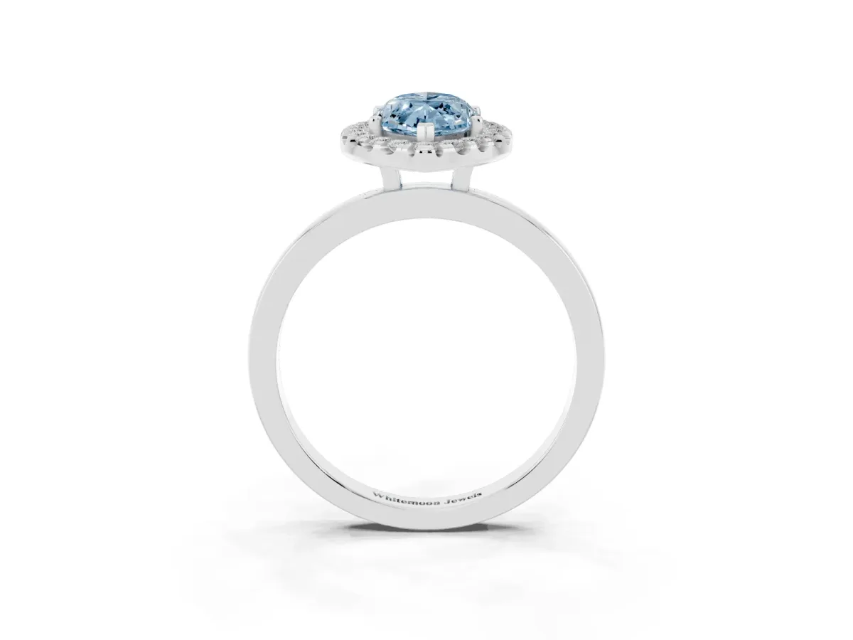 Fancy Blue Marquise Cut Halo Diamond Solitaire with Pavé Band and Four-Prong Setting White gold