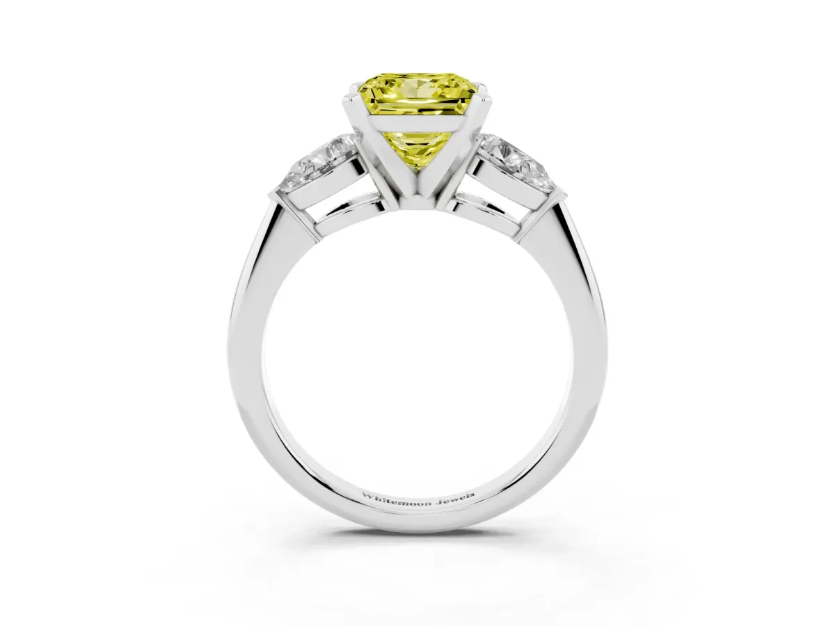 Fancy Yellow Three-Stone Princess Cut Diamond Ring with Pear Side Stones and Four-Prong Setting Silver