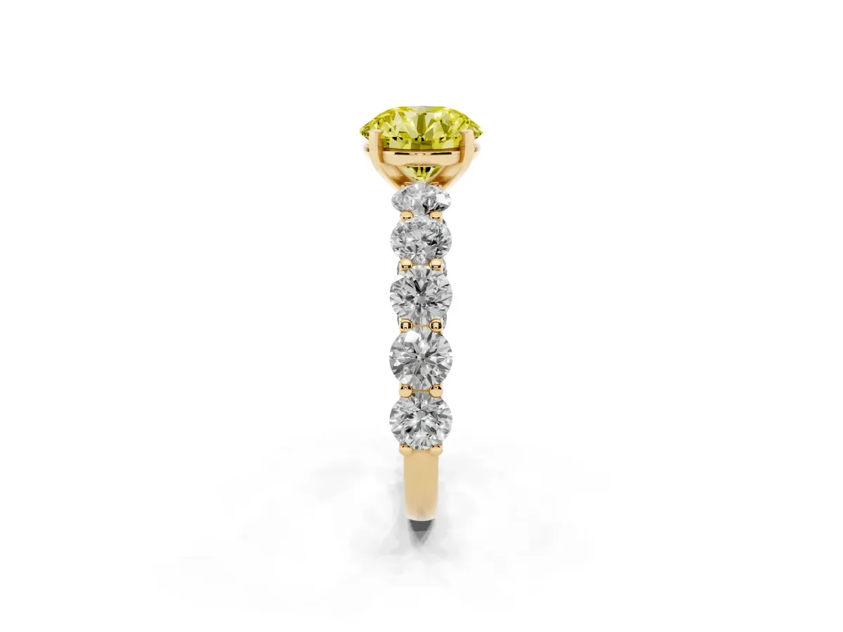 Fancy Yellow Round Cut Diamond Prong Setting with Side Stones on a Pave Band Yellow gold