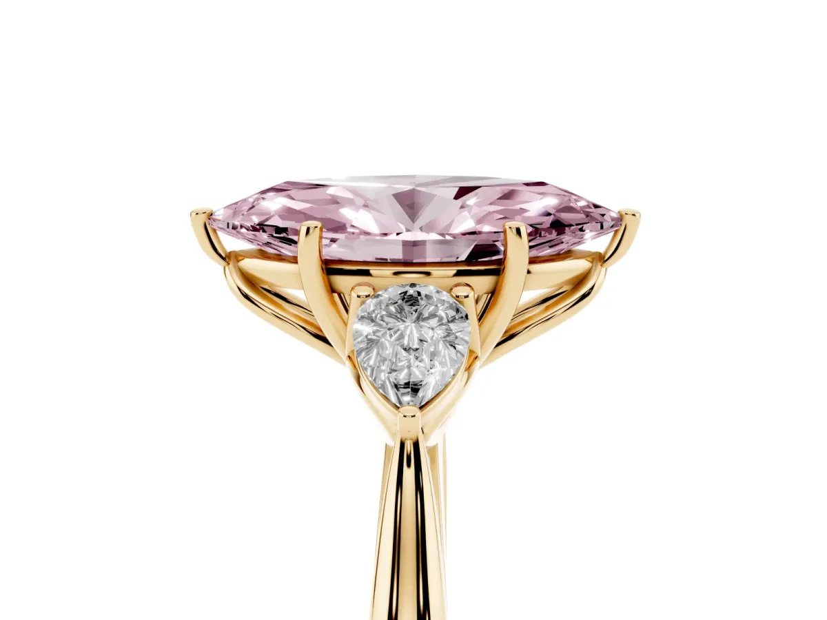 Fancy Pink Marquise Cut Diamond Three-Stone Ring with Pear Side Stones and Prong Setting Yellow gold