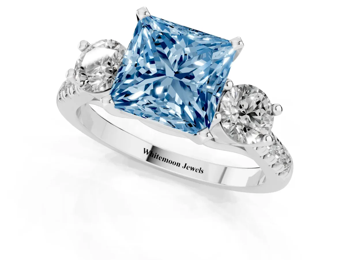 Fancy Blue Three-Stone Princess Cut Diamond Pavé Band with Four-Prong Setting Silver