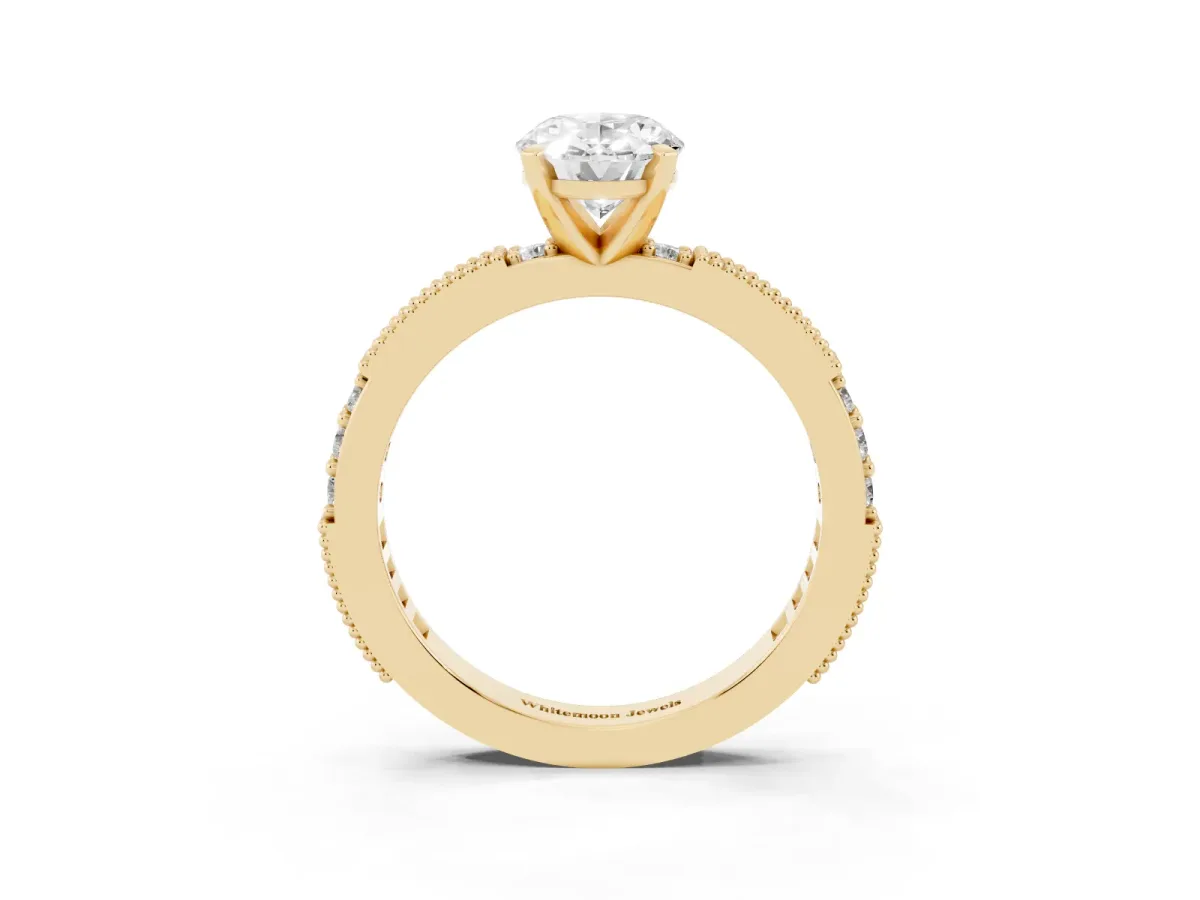 Oval Cut Solitaire with Pavé Band and Four-Prong Setting Yellow gold