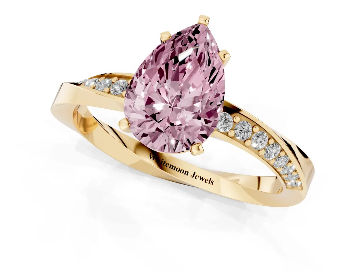 Fancy Pink Pear Cut Diamond Engagement Ring with Side Stone Accents and Four-Prong Setting Yellow gold