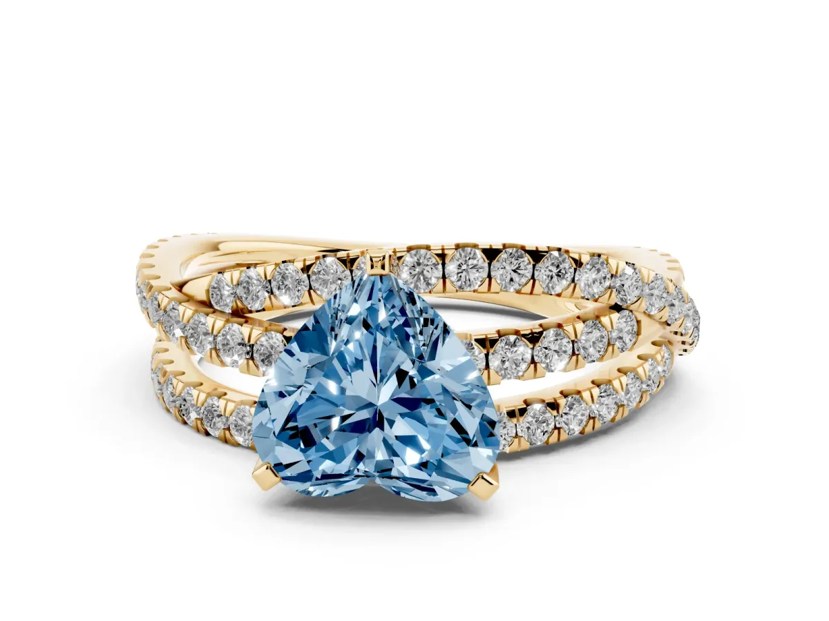 Fancy Blue Heart Cut Solitaire Twist Band with Pavé Setting and Four-Prong Setting Yellow gold