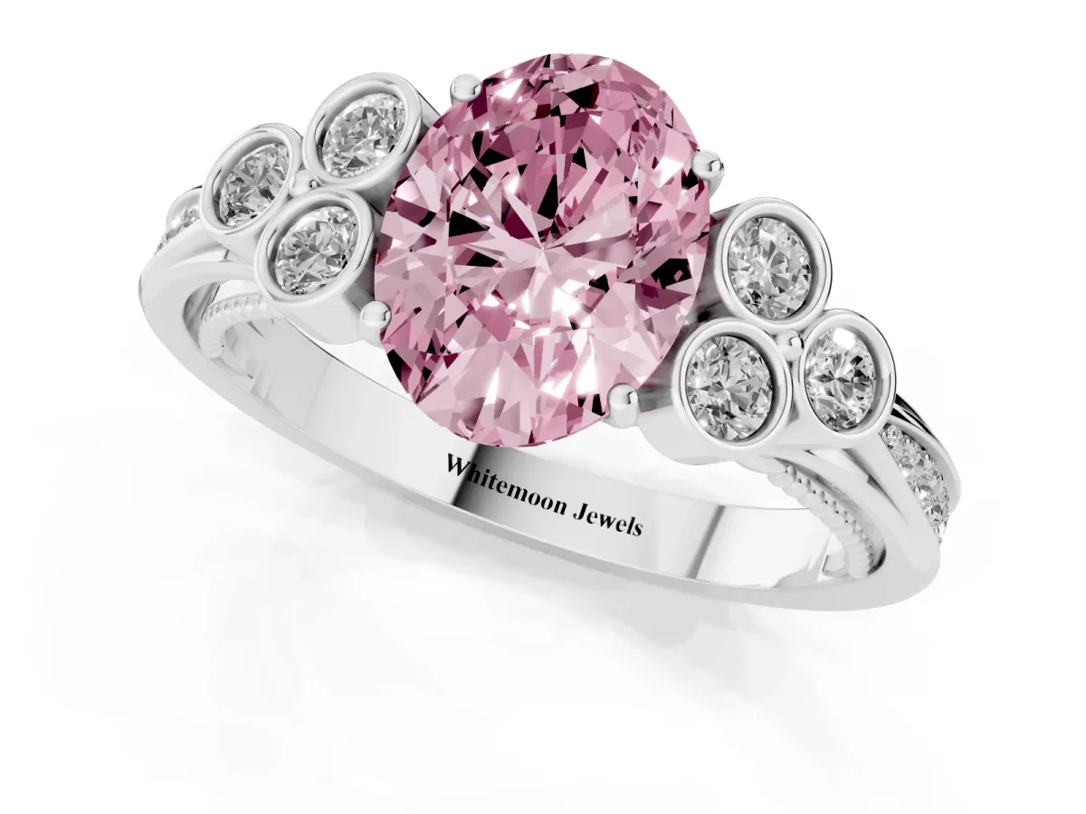 Fancy Pink Oval Cut Cut Diamond Engagement Ring with Bezel Set Round Side Stones and Prong Setting White gold