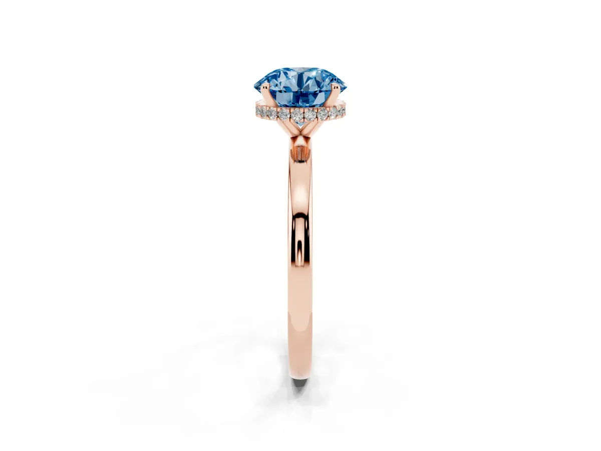 Fancy Blue Round Cut Solitaire Engagement Ring with Cathedral Band and Four-Prong Setting Rose gold