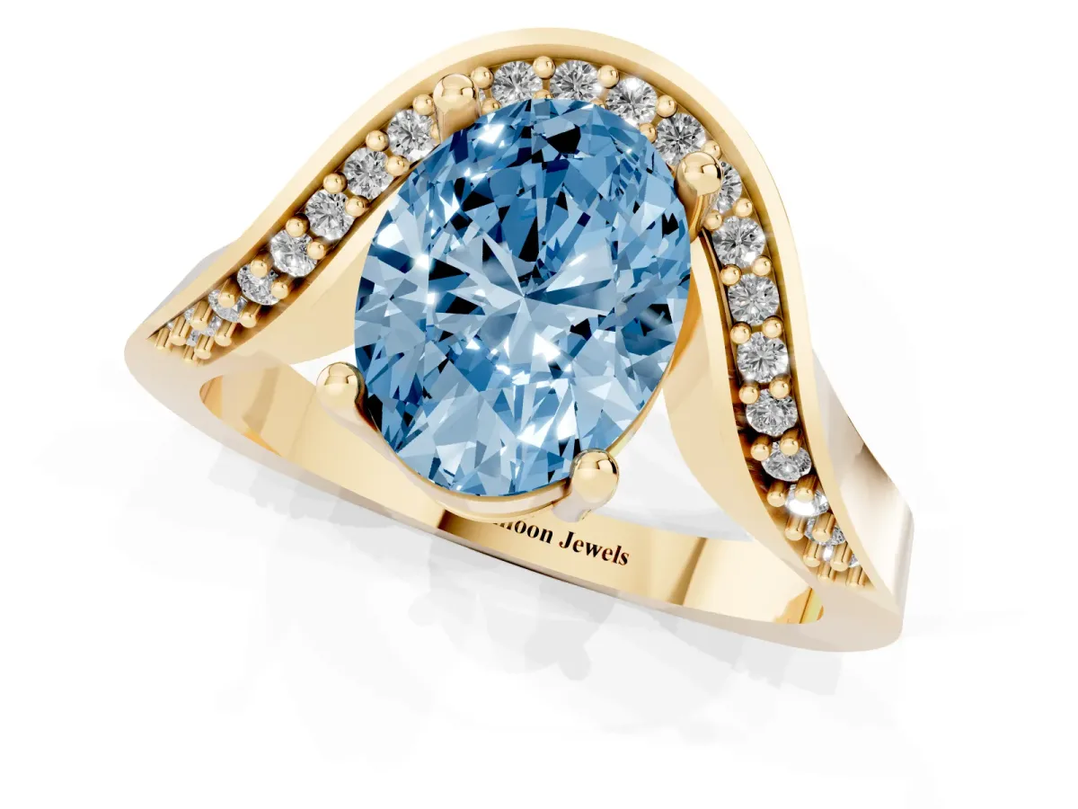 Fancy Blue Oval Cut Solitaire Diamond Engagement Ring with Pave Band and Four-Prong Setting Yellow gold