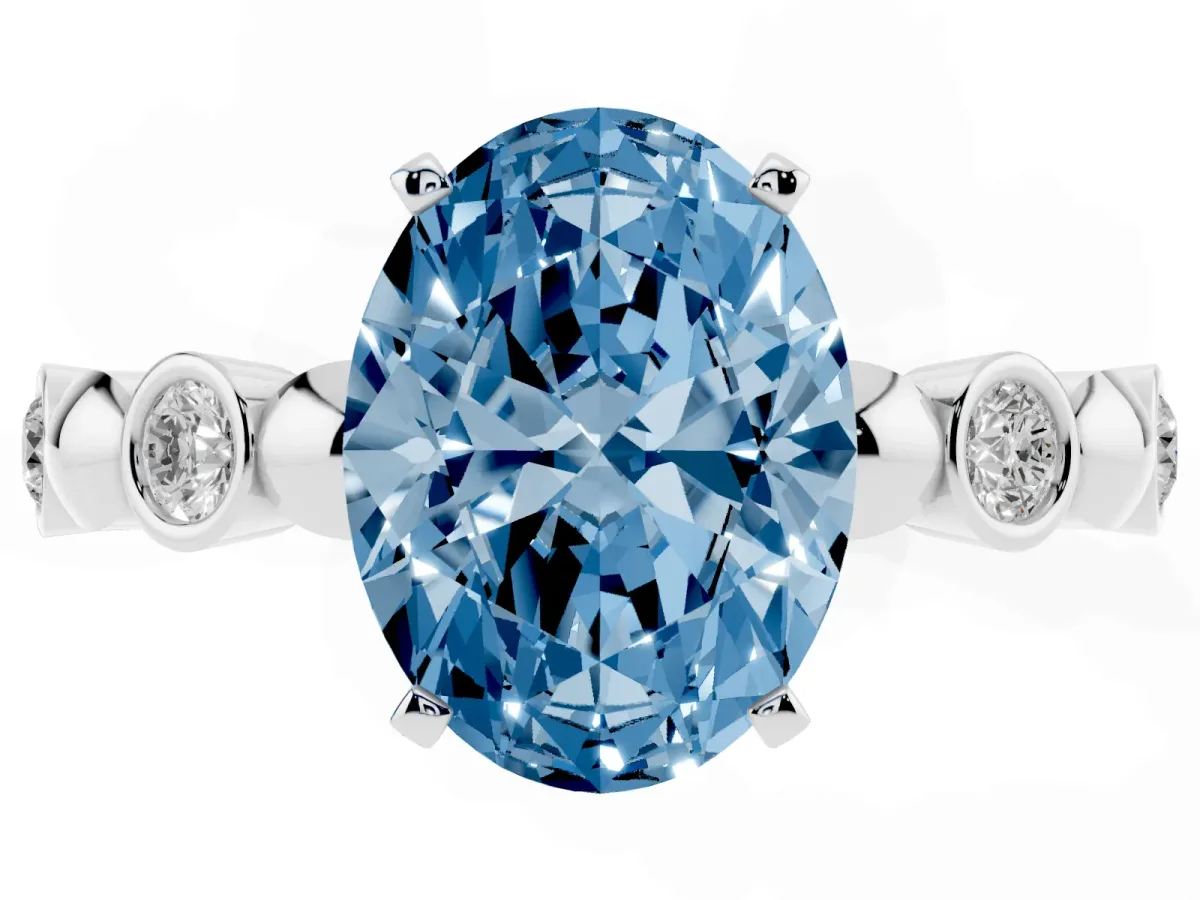 Fancy Blue Oval Cut Solitaire Bezel-Set Diamond Ring with Beaded Band and Four-Prong Setting Silver
