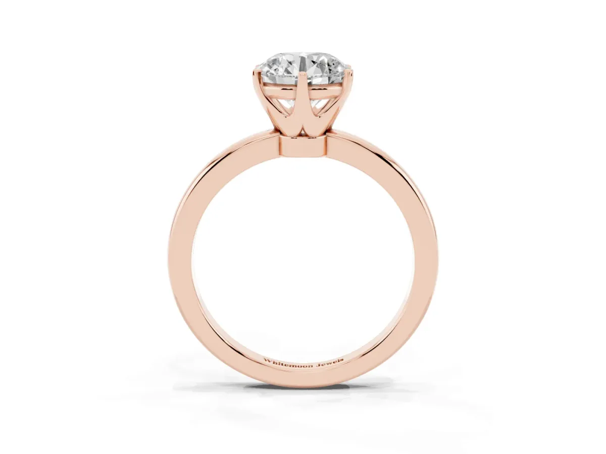 Round Cut Solitaire Diamond Ring with Six-Prong Setting on a Classic Band Rose gold