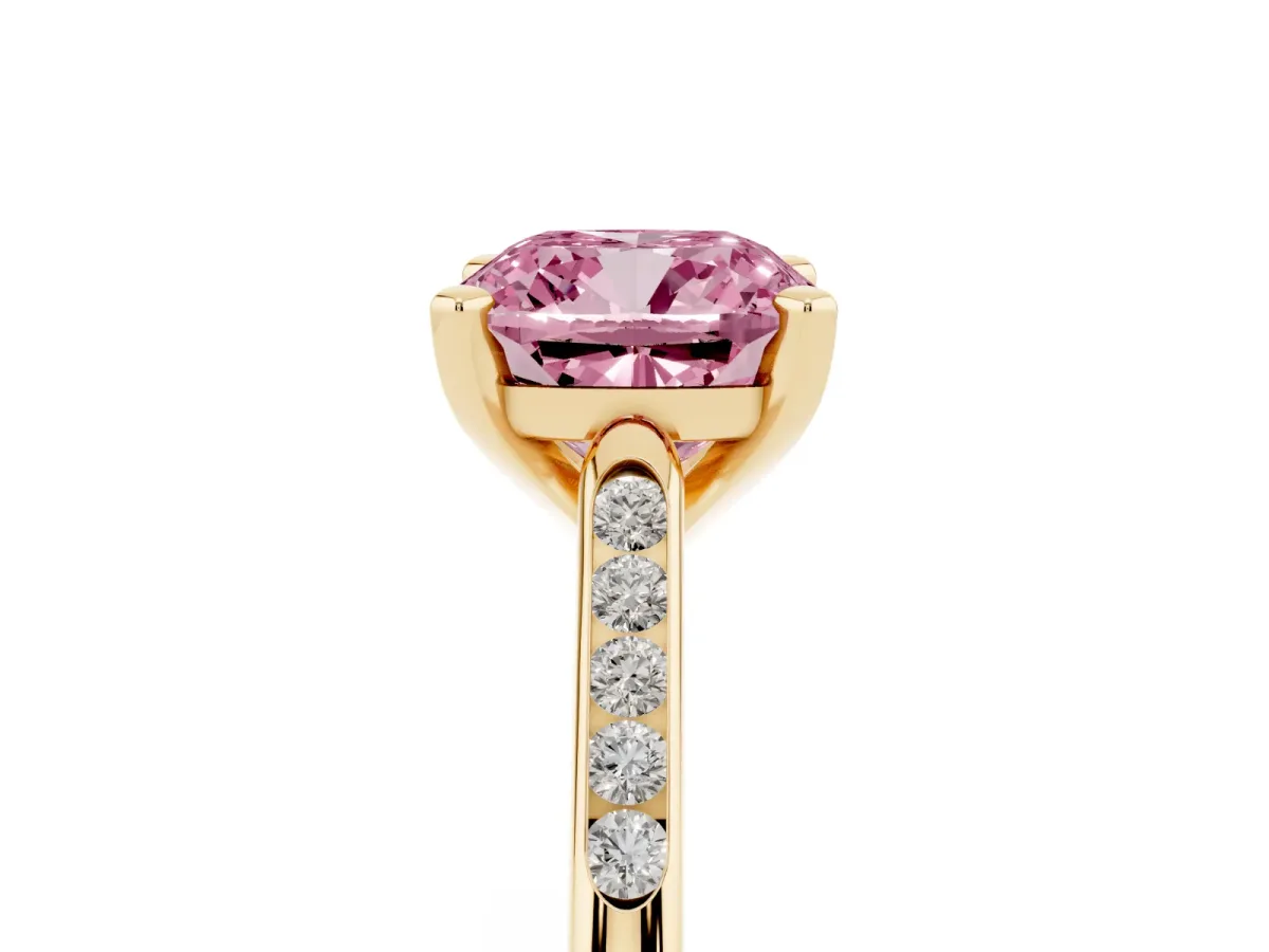 Fancy Pink Cushion Cut Diamond Solitaire Ring with Channel Set Round Band and Prong Setting Yellow gold