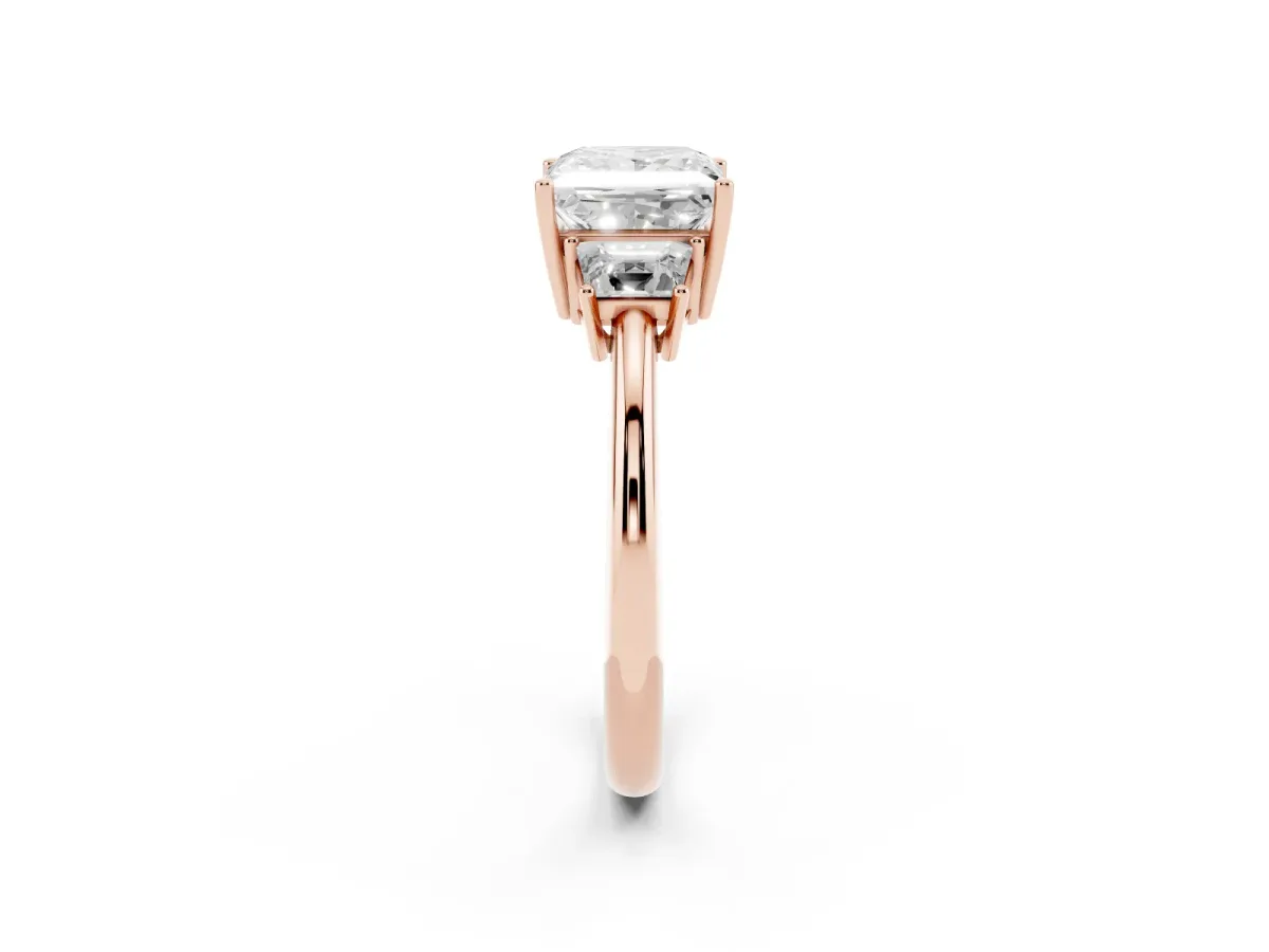 Princess Cut Diamond Three-Stone Ring with Trapezoid Side Stones and Prong Setting Rose gold