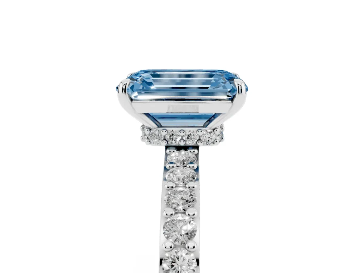 Fancy Blue Emerald Cut Diamond Pavé Engagement Ring with Round Accents and Prong Setting Platinum