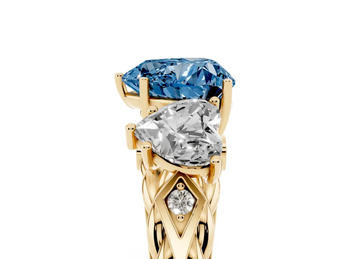 Fancy Blue Three-Stone Heart Cut Diamond Braided Band Ring with Four-Prong Setting Yellow gold
