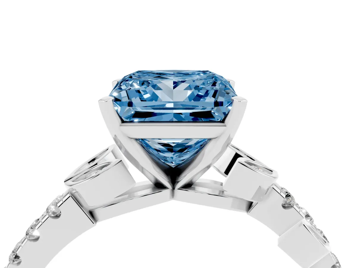 Fancy Blue Princess Cut Solitaire Leaf-Inspired Diamond Ring with Pavé Band and Four-Prong Setting Silver
