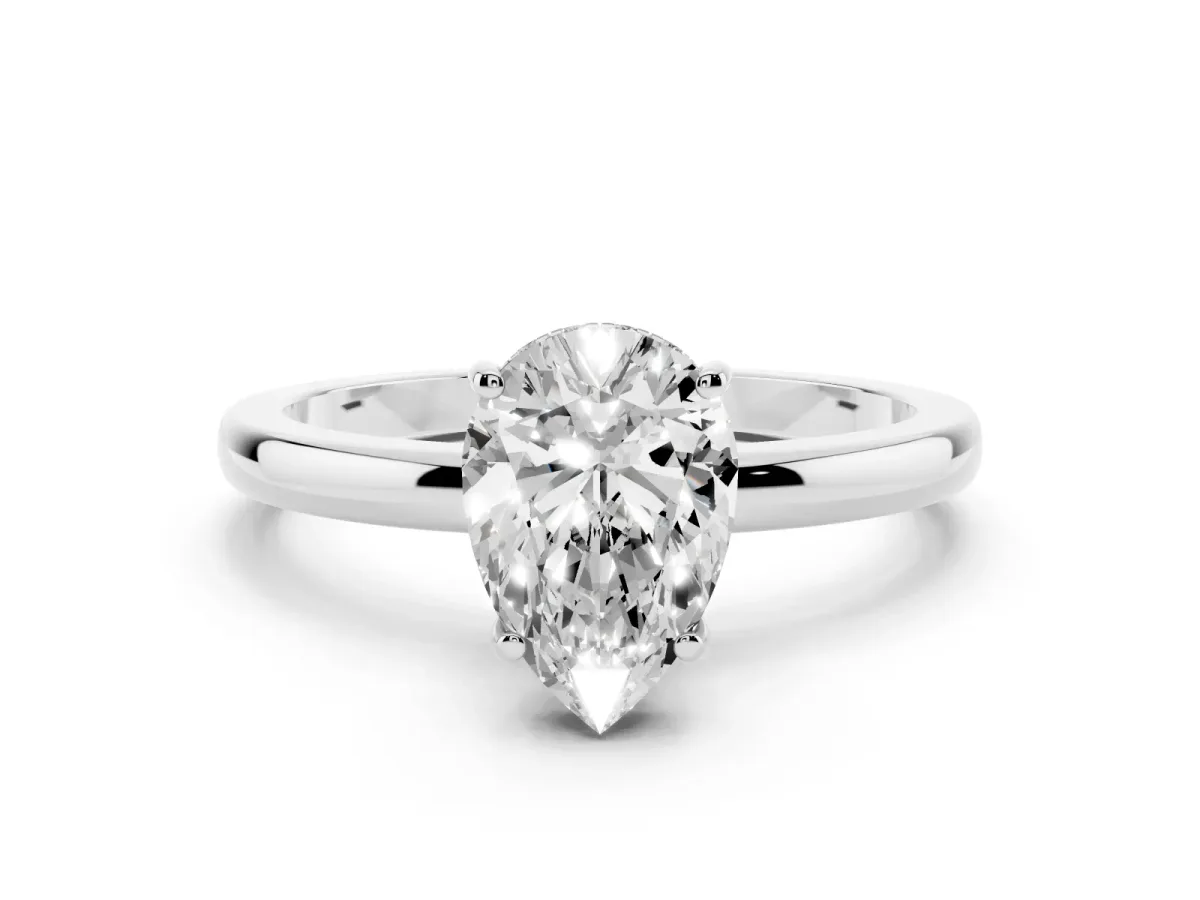 Pear Cut Solitaire Diamond Ring with Prong Setting and Plain Band Platinum