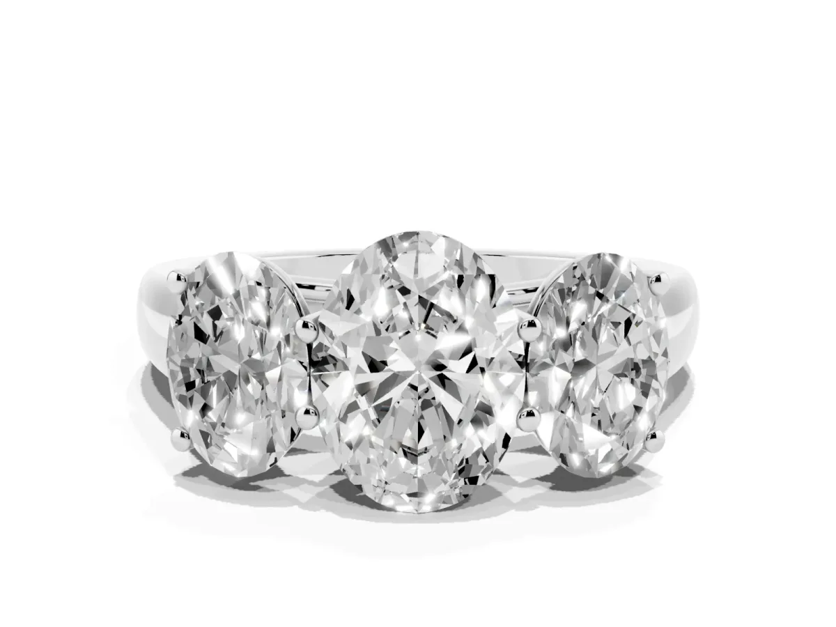 Oval Cut Three-Stone Diamond Ring with Prong Setting on a Classic Band Silver