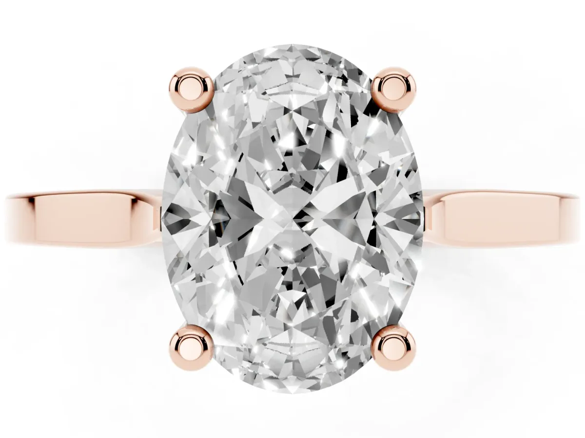 Oval Cut Solitaire Diamond Ring with Four-Prong Setting and Tapered Band Rose gold