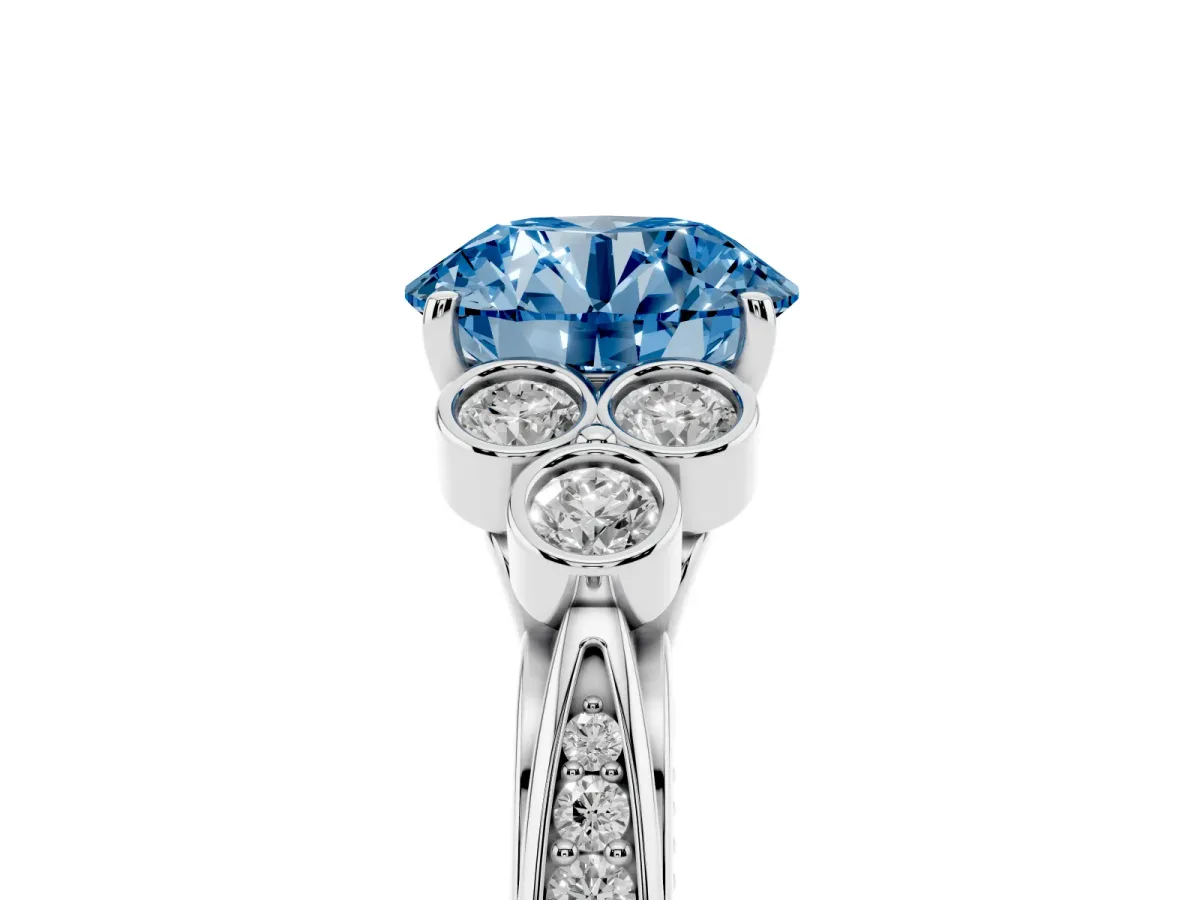 Fancy Blue Round Cut Cut Diamond Engagement Ring with Bezel Set Round Side Stones and Prong Setting Silver