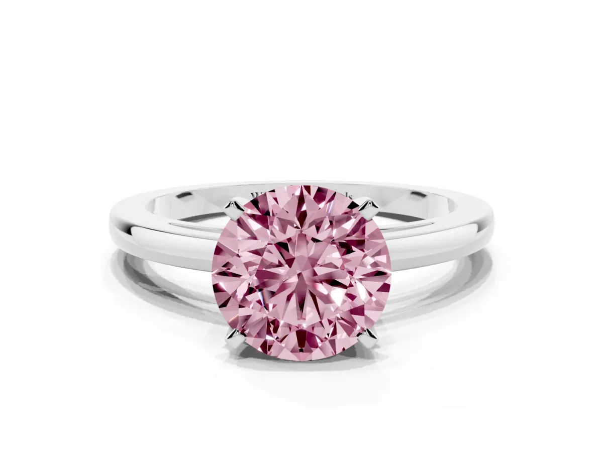Fancy Pink Round Cut Solitaire Diamond Engagement Ring with Four-Prong Setting on a Classic Band Platinum