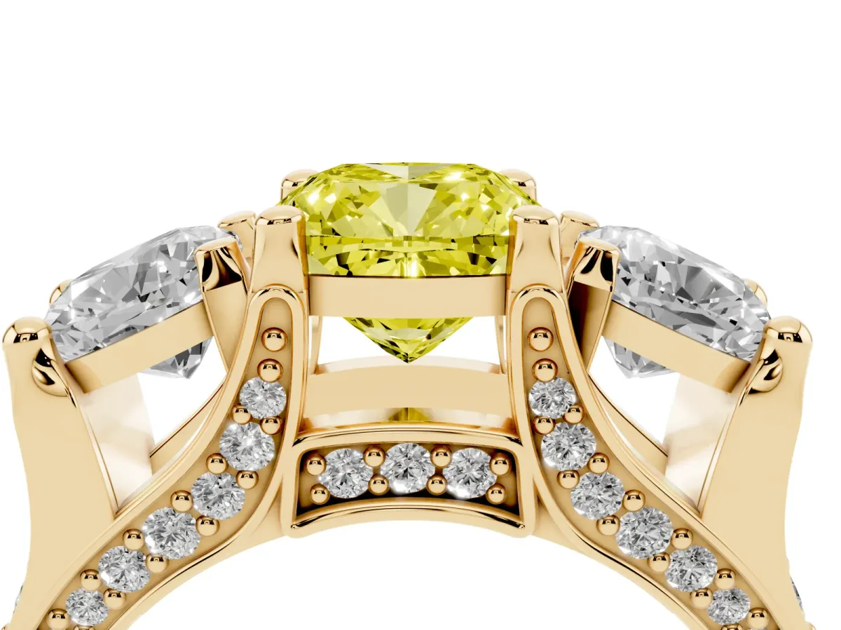 Fancy Yellow Cushion Cut Diamond Three-Stone Ring with Channel Set Band and Four-Prong Setting Yellow gold