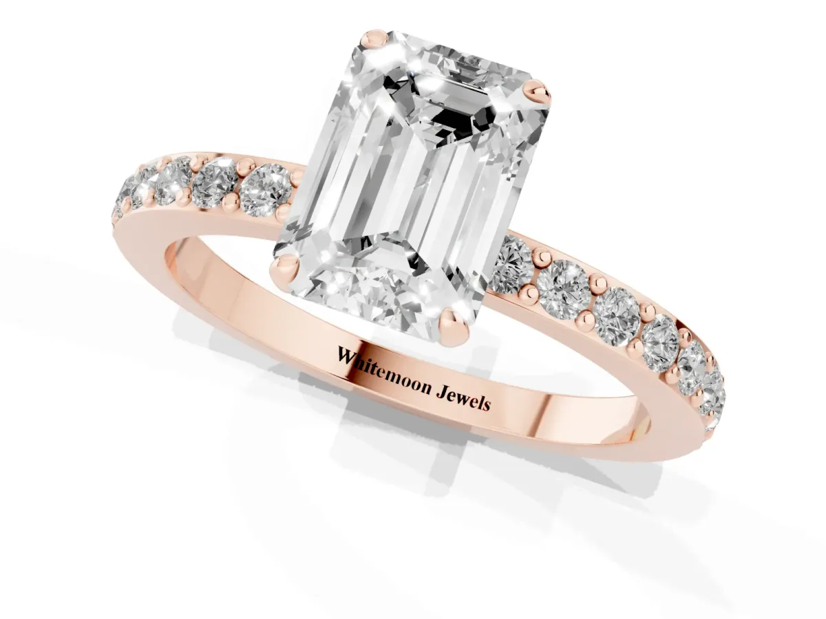 Emerald Cut Diamond Pavé Engagement Ring with Round Accents and Prong Setting Rose gold