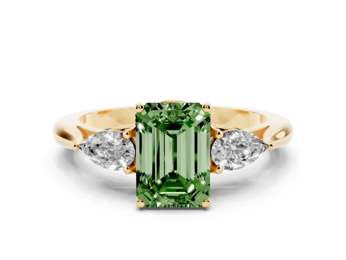Fancy Green Emerald Cut Diamond Three-Stone Ring with Pear Side Stones and Prong Setting Yellow gold